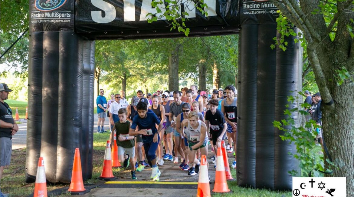 Runners gathering at community 5K race