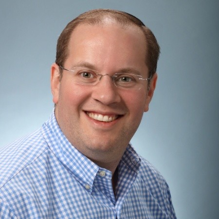 Professional headshot of Jake Adler